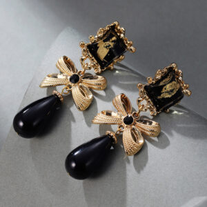 black bow pearl drop earrings
